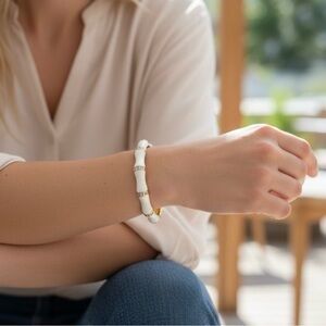 Elegant White and Gold Bracelet